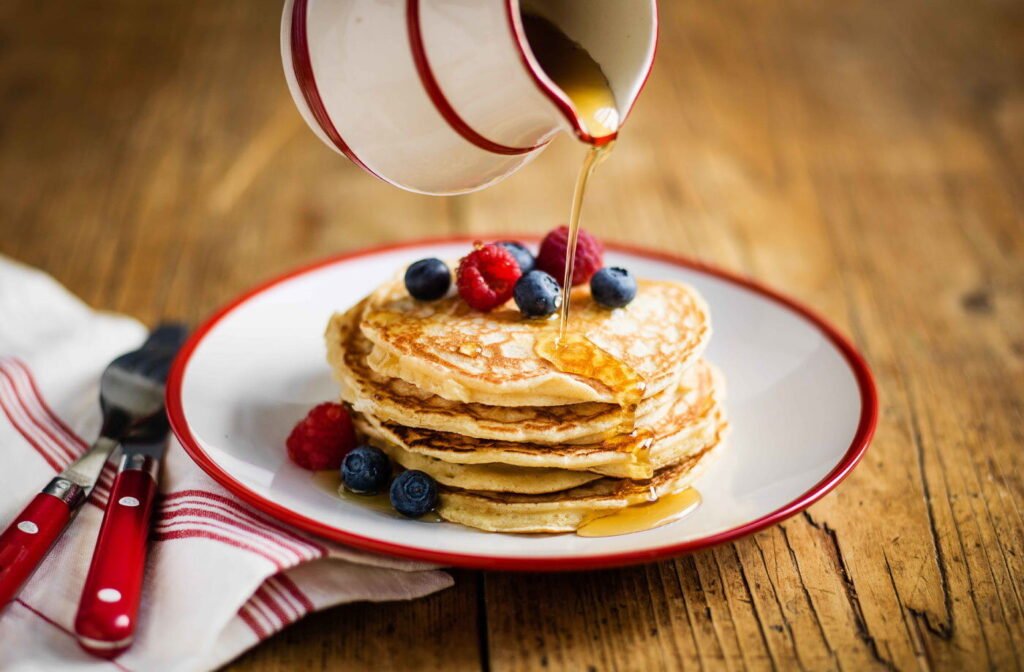 Fluffy American Pancakes with Maple Syrup and Berries