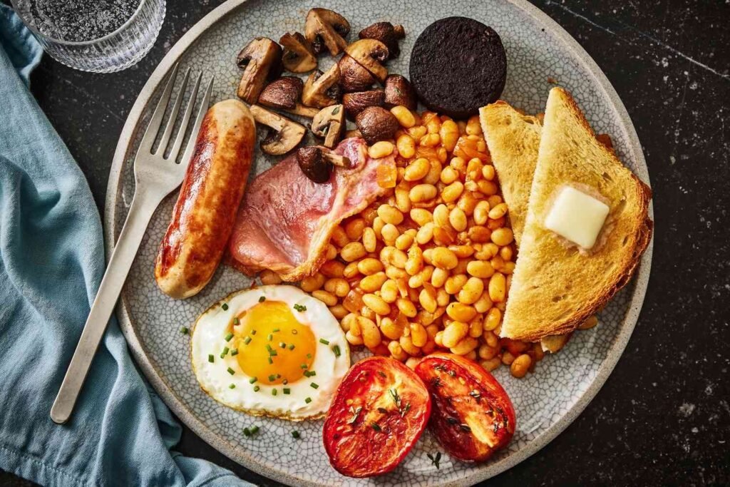 Traditional Full English Breakfast with Eggs and Sausages